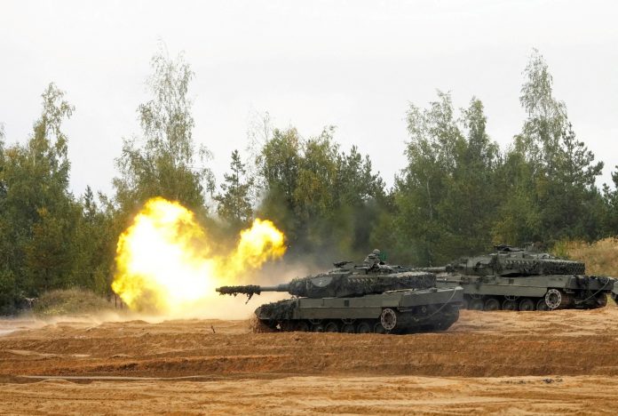 2023-01-25t154038z-1621074297-rc2yqw99e1ad-rtrmadp-3-ukraine-crisis-arms-leopard-1-scaled